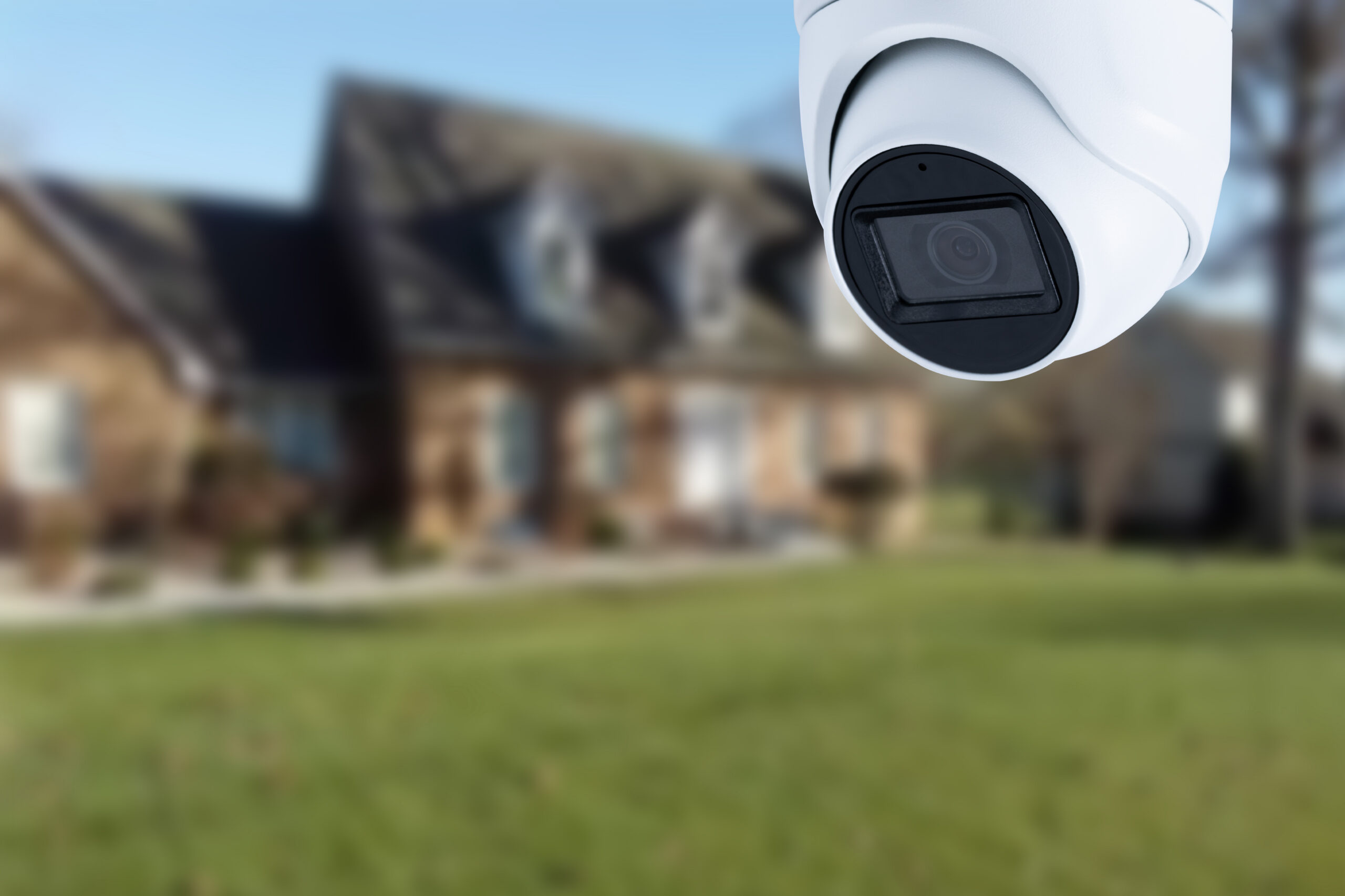 Security camera and private house on the background.