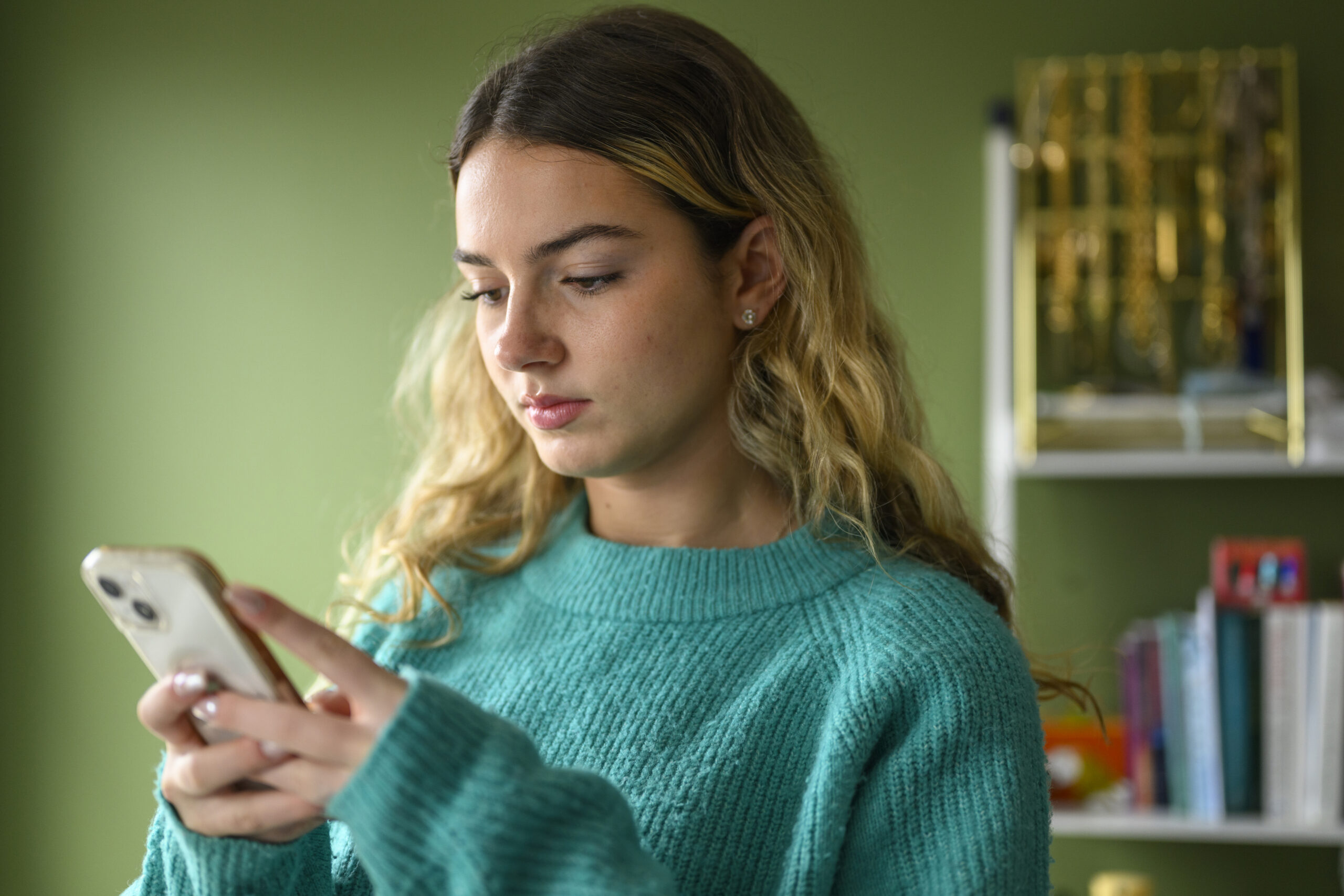 Teen using a smartphone